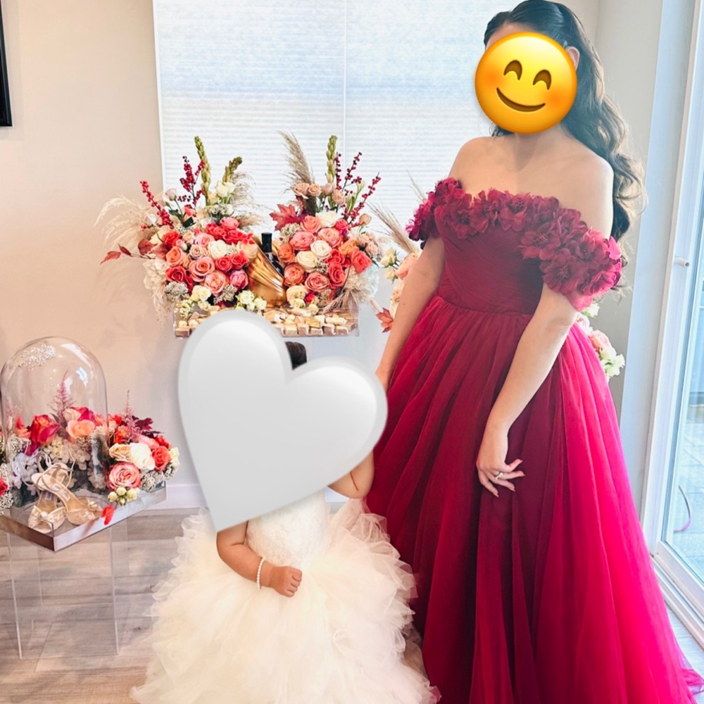 Teuta Matoshi royal crimson gown